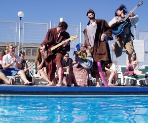 Jesse jumping with guitar in Cap'n Patchnee and the Legendary Siren of Killian the Red